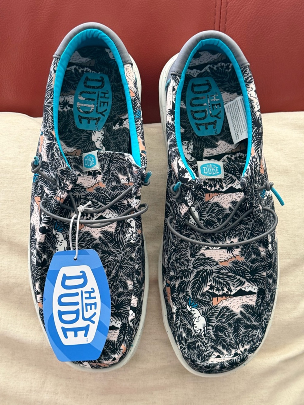 New with tags!Hey Dude Men’s Tropical Print Boat Shoes in Black & Teal